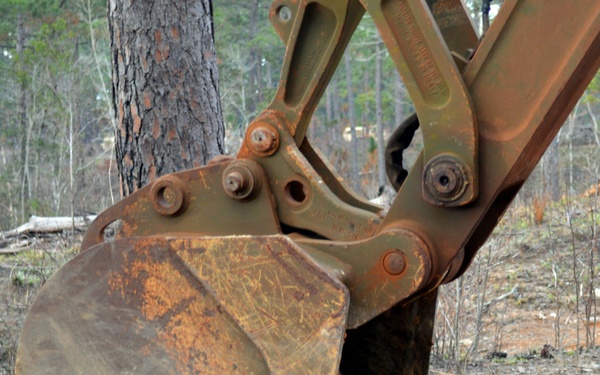 Engineers dig troop trenches for defense at JRTC