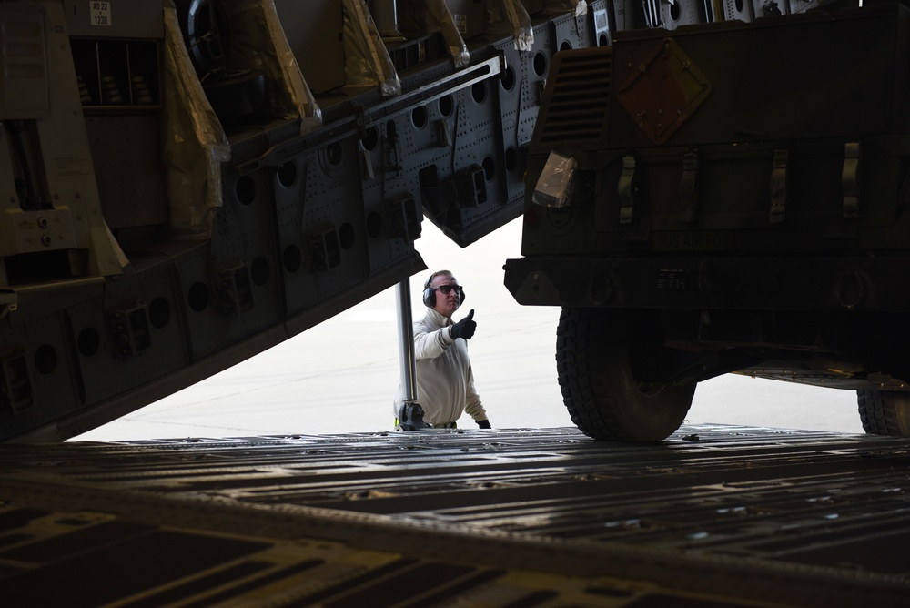30th Logistics Readiness Squadron Air Transportation technicians at work