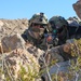 U.S. Soldiers scan for simulated enemies at an observation post