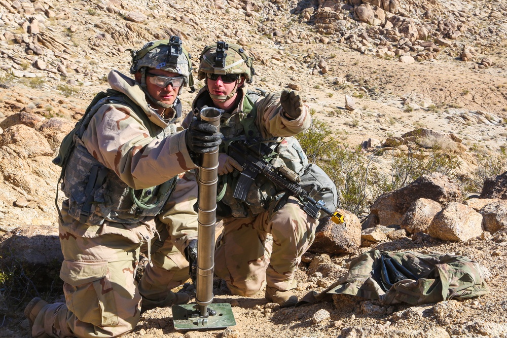 U.S. Soldiers rehearse on operating a mortar weapon system at an observation post