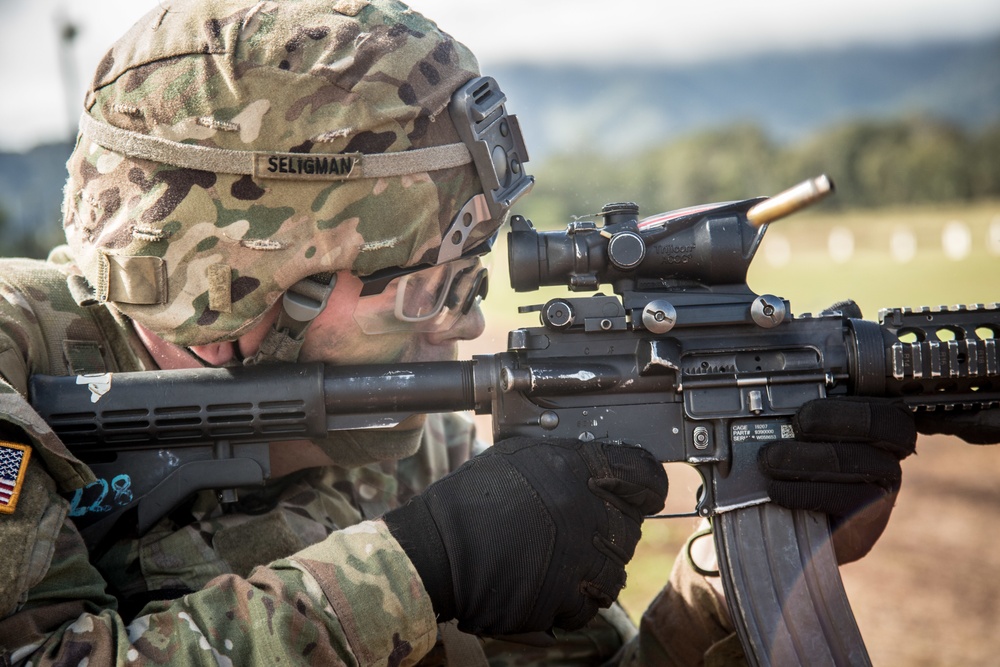 Soldier firing M4 at the qualification range