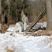 Cold-Weather Operations Course Class 18-04 students build improvised shelters during training at Fort McCoy