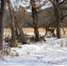 Cold-Weather Operations Course Class 18-04 students build improvised shelters during training at Fort McCoy