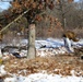 Cold-Weather Operations Course Class 18-04 students build improvised shelters during training at Fort McCoy