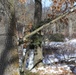 Cold-Weather Operations Course Class 18-04 students build improvised shelters during training at Fort McCoy