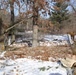 Cold-Weather Operations Course Class 18-04 students build improvised shelters during training at Fort McCoy