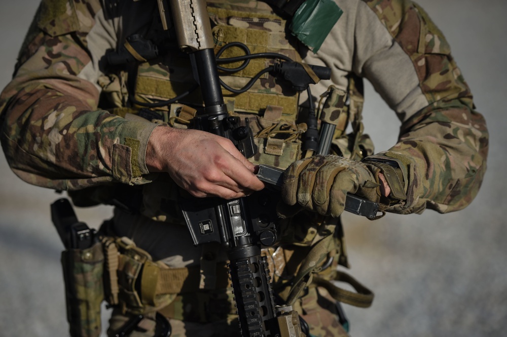 83rd ERQS pararescuemen Conduct Weapons training in Afghanistan
