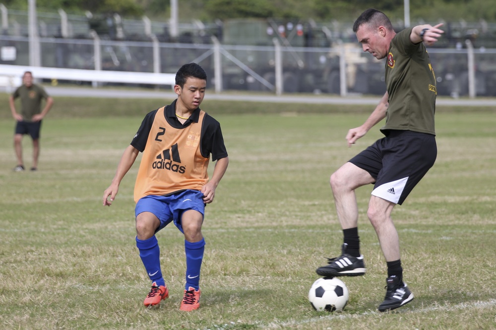 31st MEU Marines and Sailors play soccer with local Okinawans