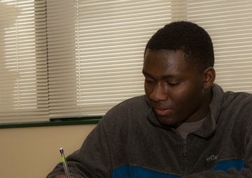 M.C. Perry student wrestles busy schedule,makes his way to top