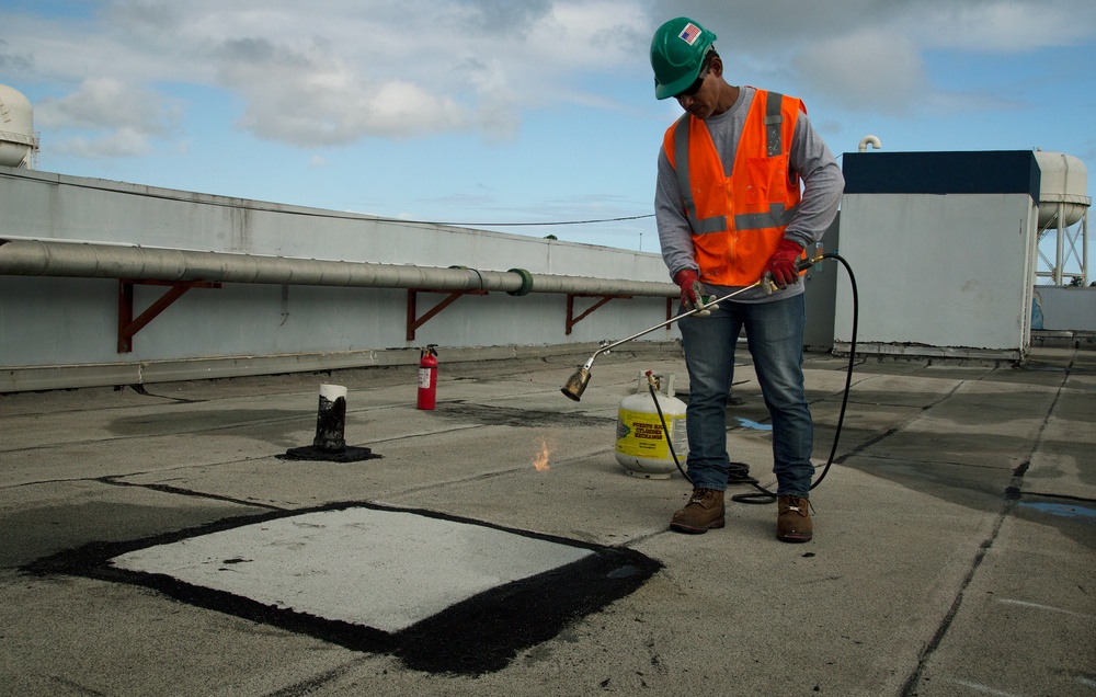 Removing Damaged Asphaltic Membrane from Critical Public Facility