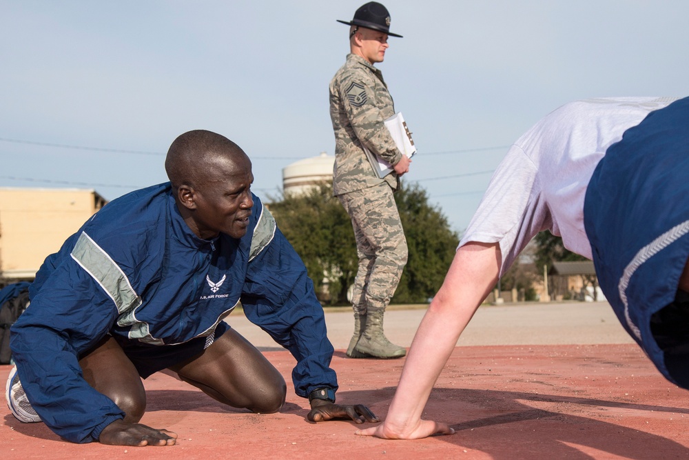 Former slave, two-time Olympian becomes an Airman