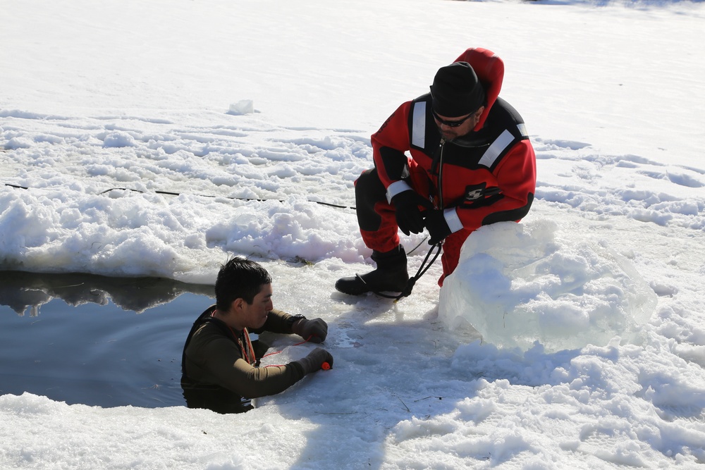 Cold-Weather Operations Course Class 18-04 students complete cold-water immersion training at Fort McCoy