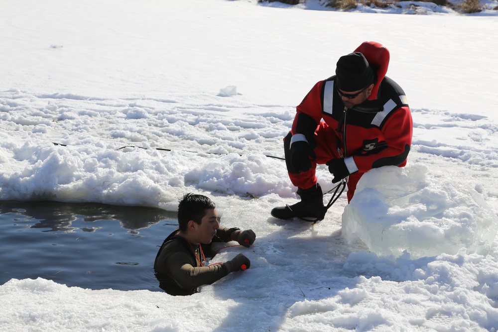 Cold-Weather Operations Course Class 18-04 students complete cold-water immersion training at Fort McCoy