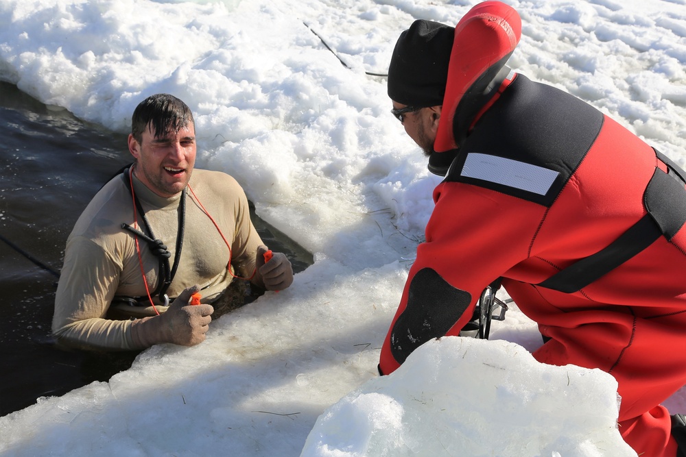 Cold-Weather Operations Course Class 18-04 students complete cold-water immersion training at Fort McCoy