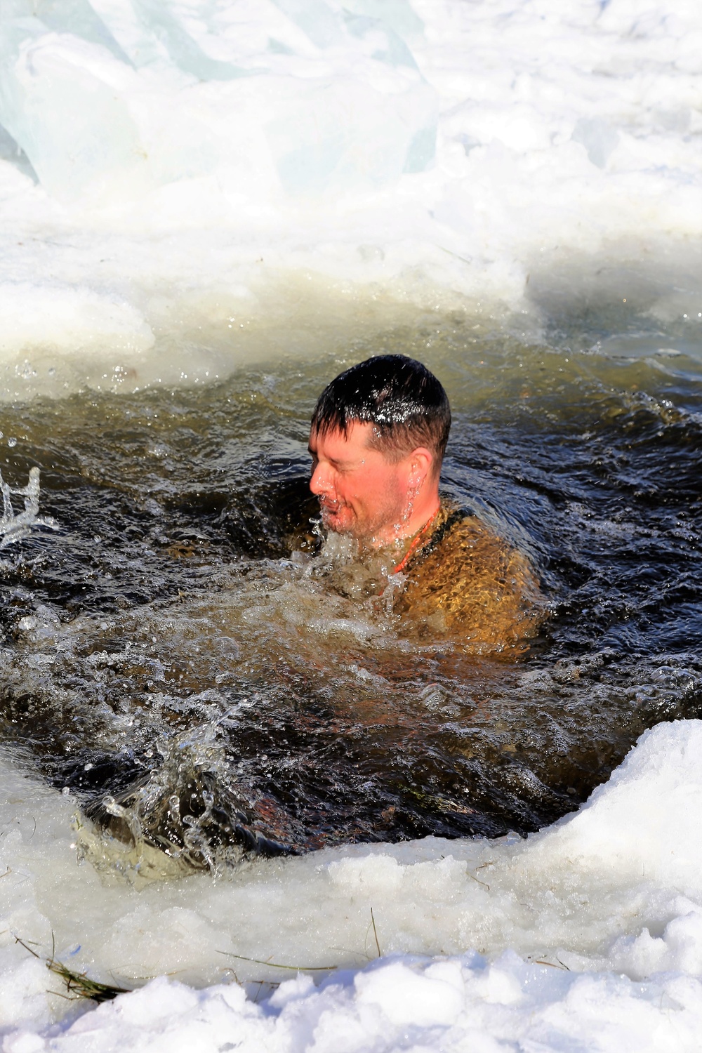 Cold-Weather Operations Course Class 18-04 students complete cold-water immersion training at Fort McCoy