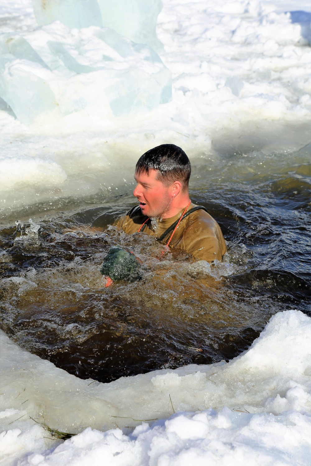 Cold-Weather Operations Course Class 18-04 students complete cold-water immersion training at Fort McCoy