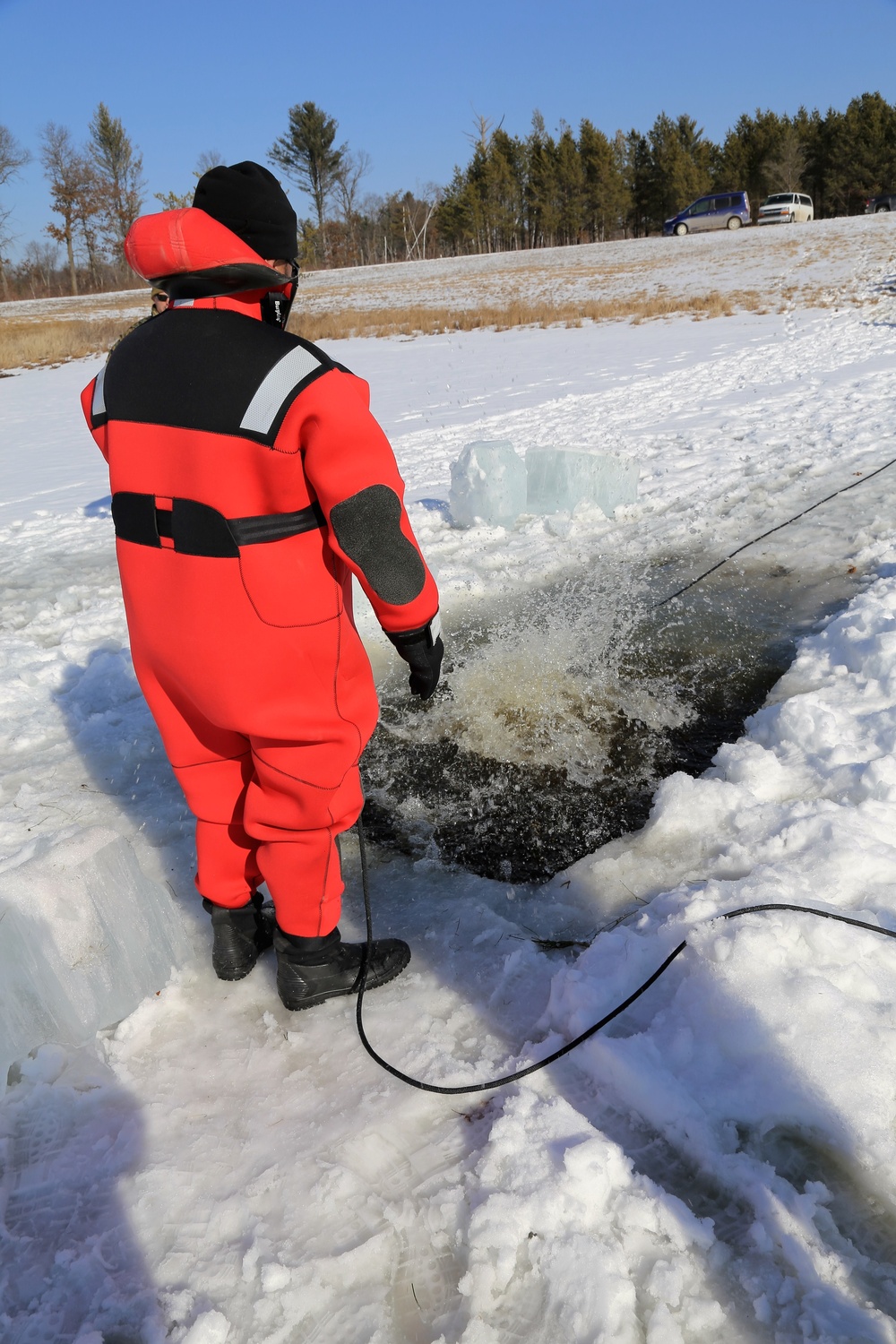 Cold-Weather Operations Course Class 18-04 students complete cold-water immersion training at Fort McCoy