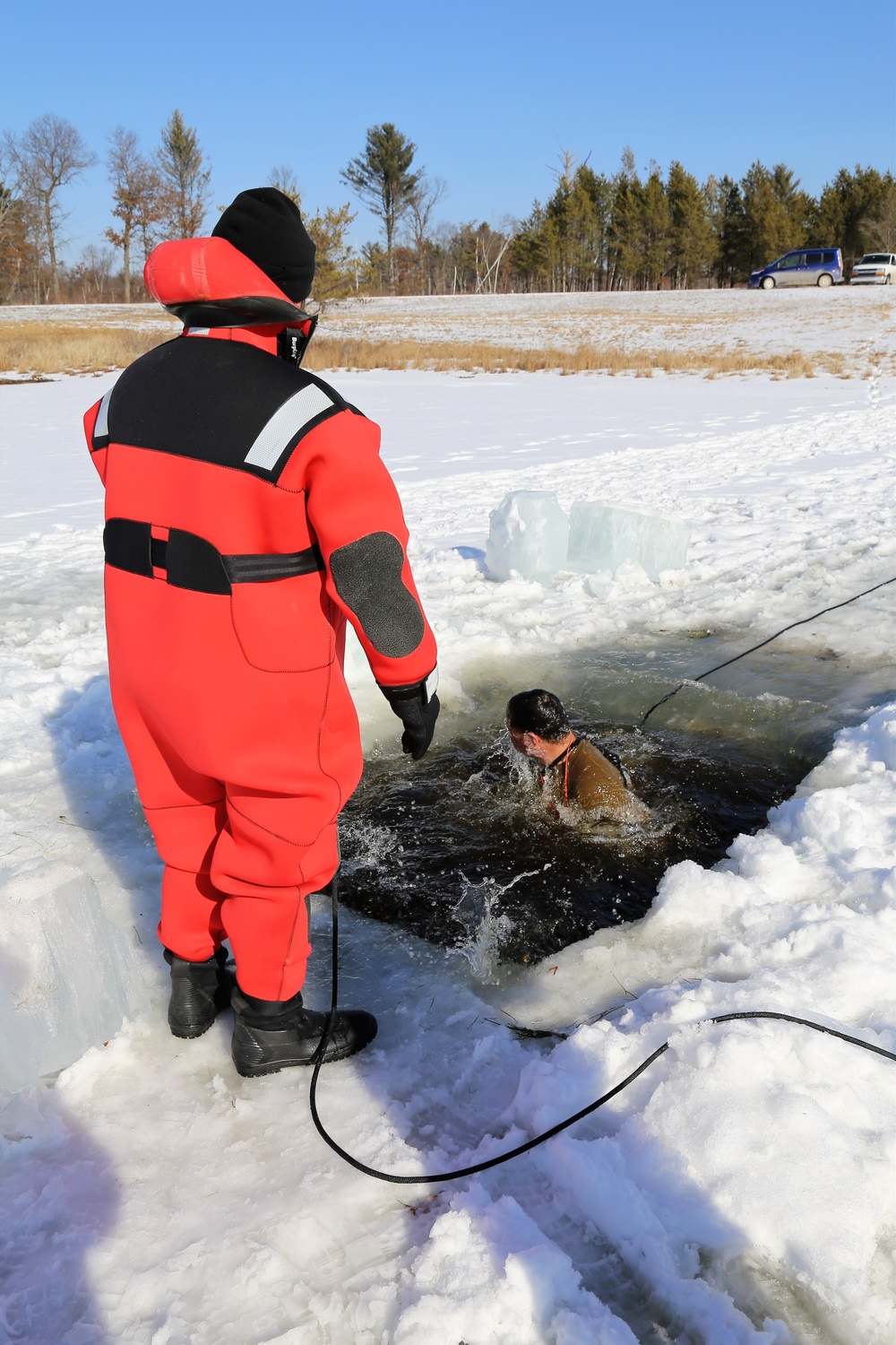 Cold-Weather Operations Course Class 18-04 students complete cold-water immersion training at Fort McCoy