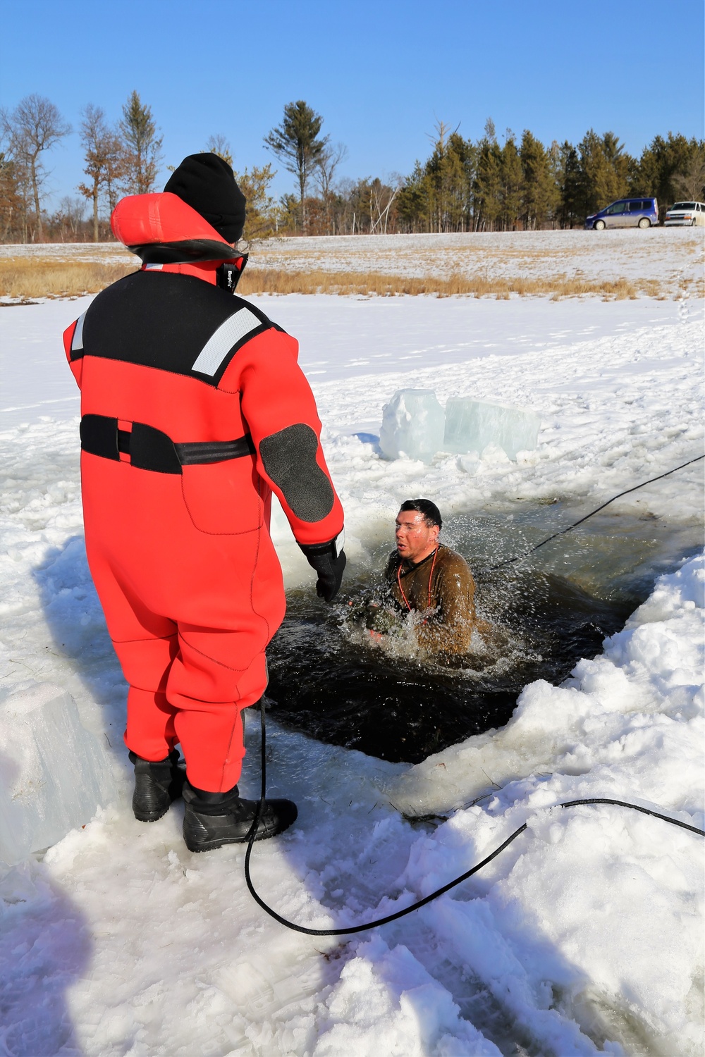 Cold-Weather Operations Course Class 18-04 students complete cold-water immersion training at Fort McCoy