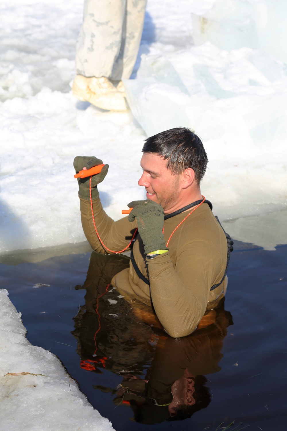 Cold-Weather Operations Course Class 18-04 students complete cold-water immersion training at Fort McCoy