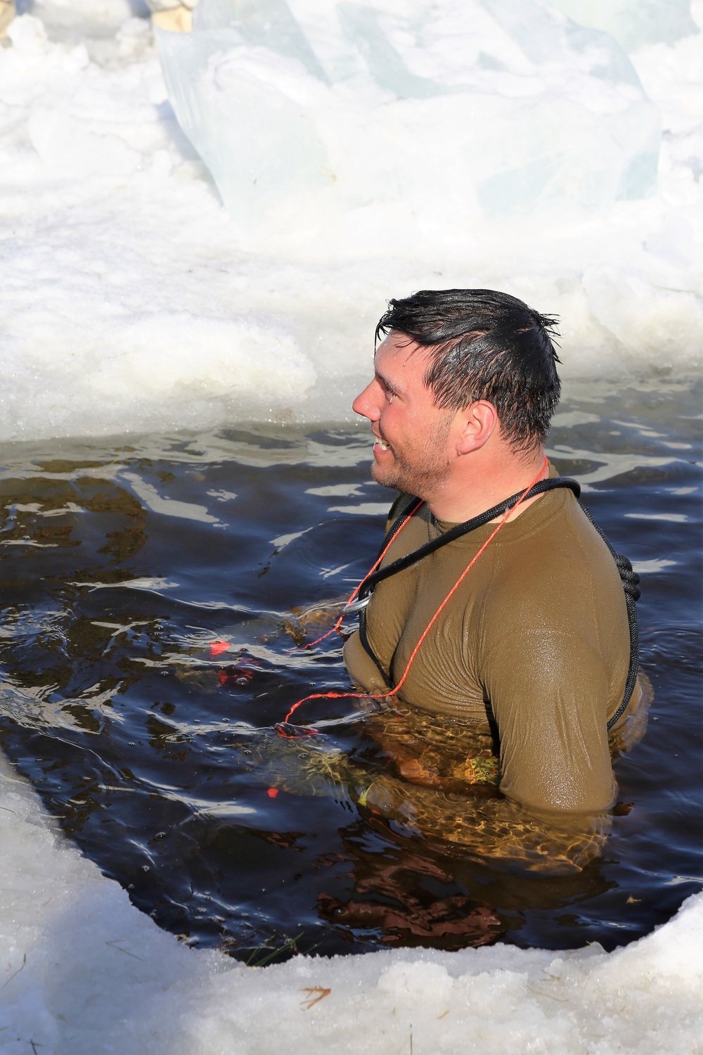 Cold-Weather Operations Course Class 18-04 students complete cold-water immersion training at Fort McCoy