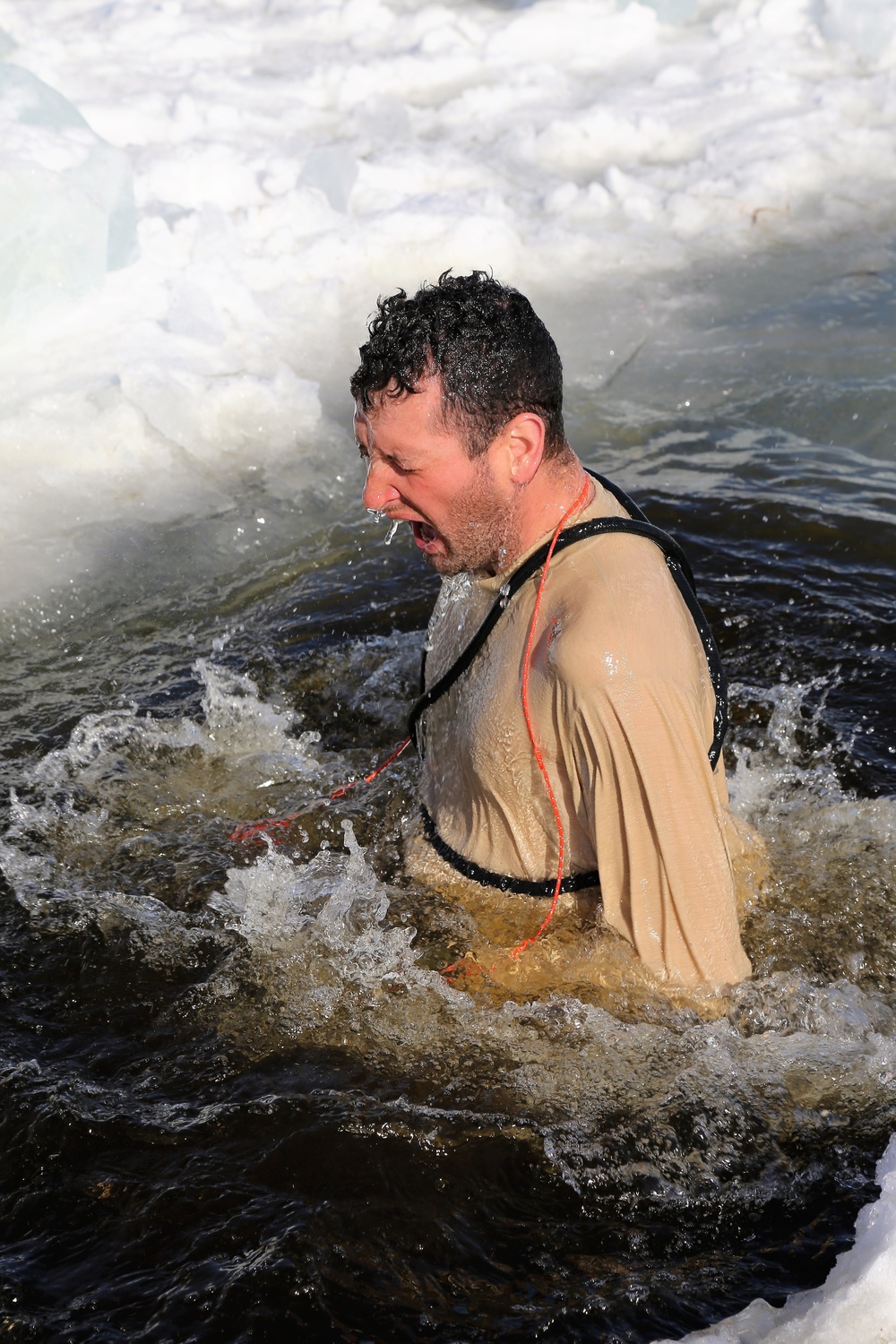 Cold-Weather Operations Course Class 18-04 students complete cold-water immersion training at Fort McCoy