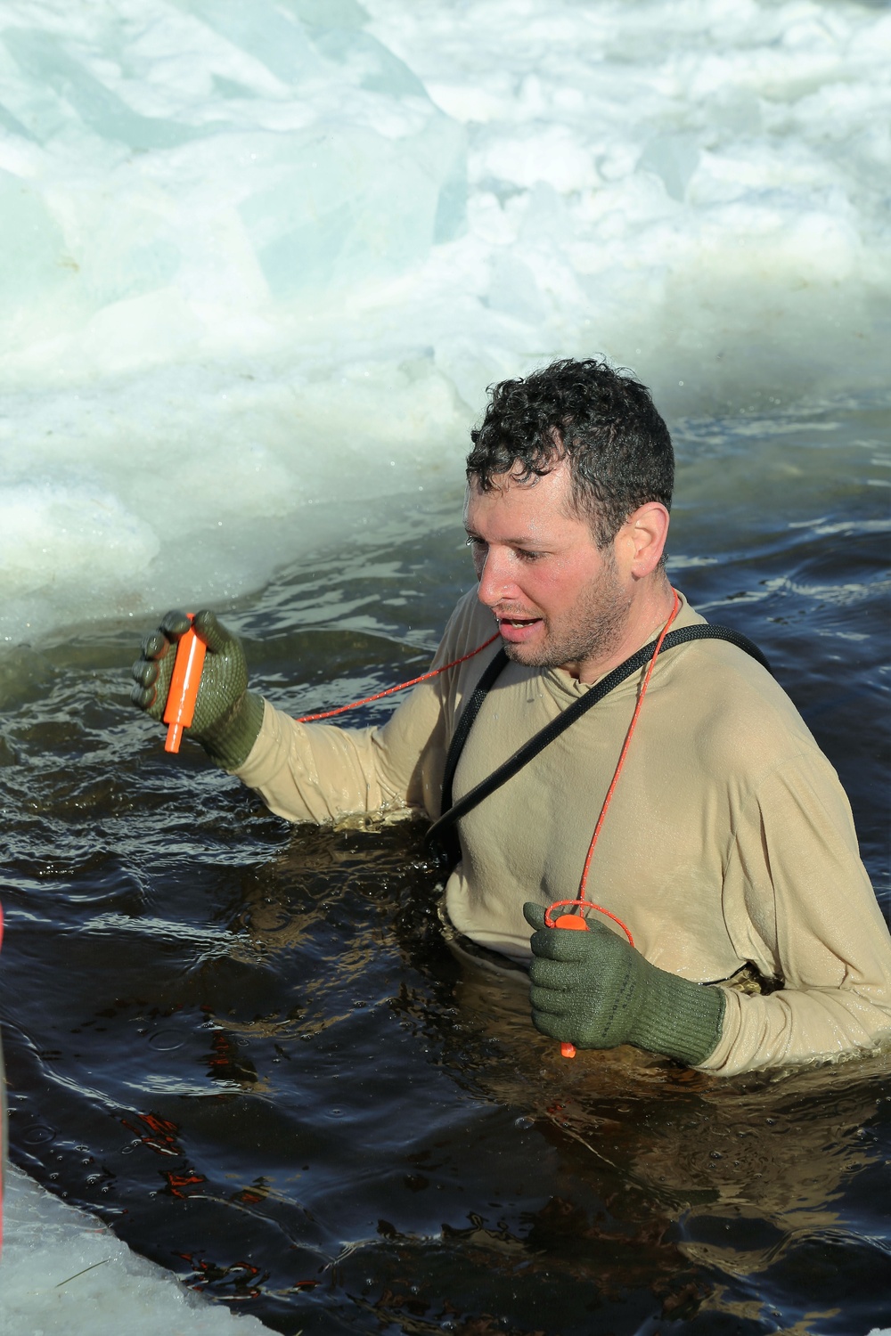 Cold-Weather Operations Course Class 18-04 students complete cold-water immersion training at Fort McCoy