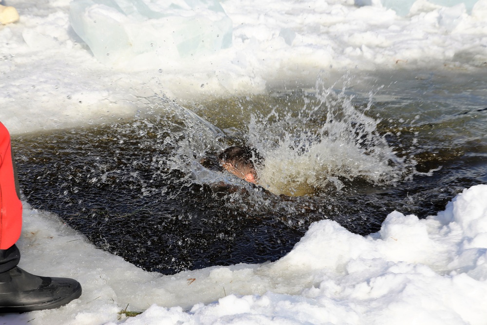 Cold-Weather Operations Course Class 18-04 students complete cold-water immersion training at Fort McCoy