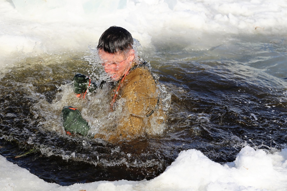 Cold-Weather Operations Course Class 18-04 students complete cold-water immersion training at Fort McCoy