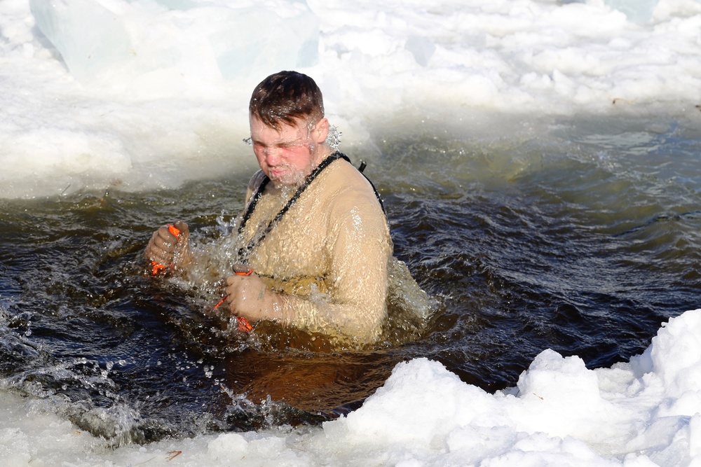 Cold-Weather Operations Course Class 18-04 students complete cold-water immersion training at Fort McCoy