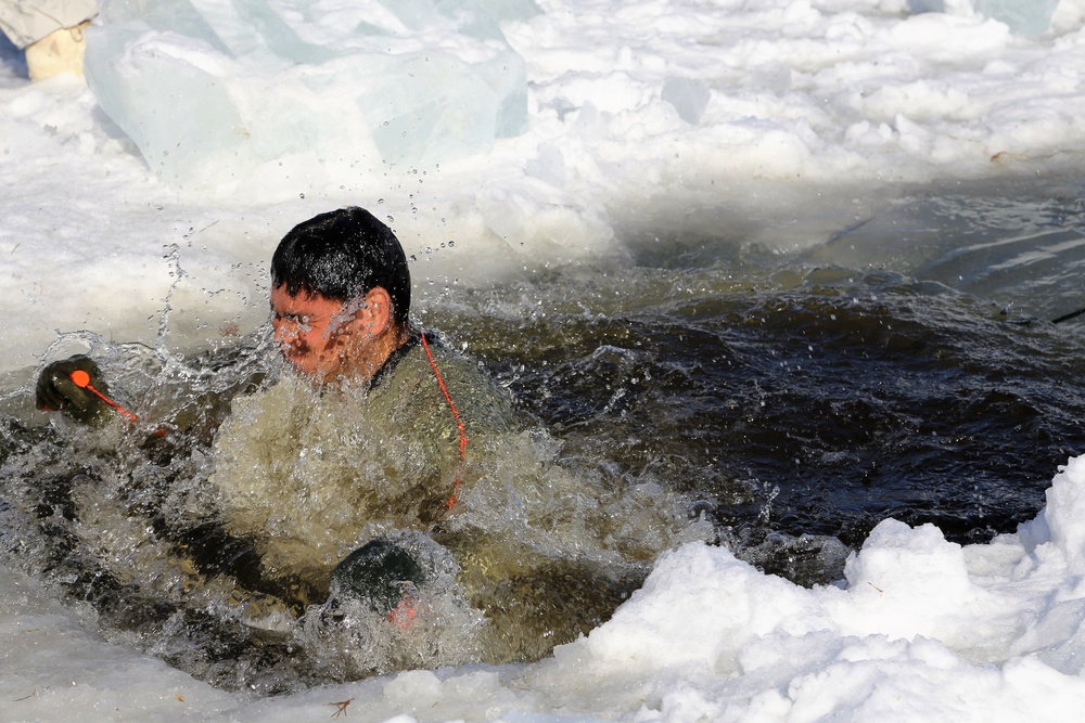 Cold-Weather Operations Course Class 18-04 students complete cold-water immersion training at Fort McCoy