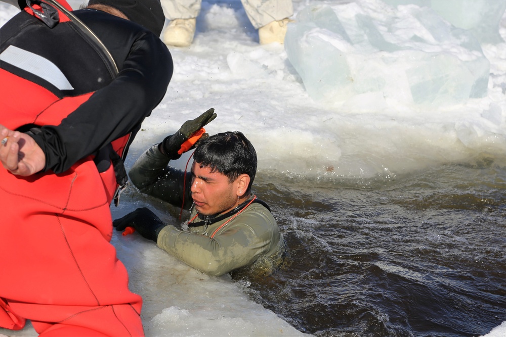 Cold-Weather Operations Course Class 18-04 students complete cold-water immersion training at Fort McCoy