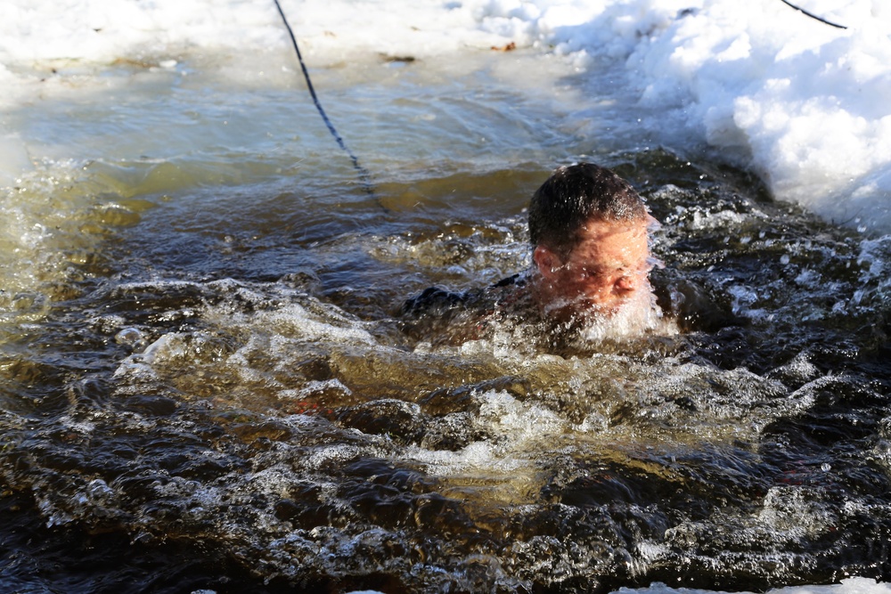 Cold-Weather Operations Course Class 18-04 students complete cold-water immersion training at Fort McCoy