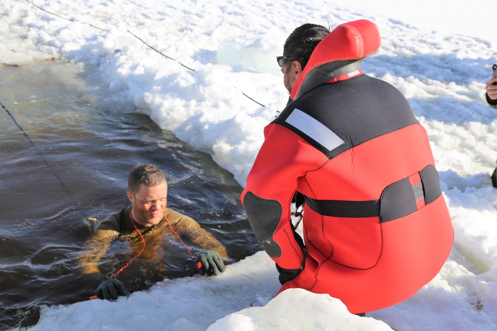 Cold-Weather Operations Course Class 18-04 students complete cold-water immersion training at Fort McCoy