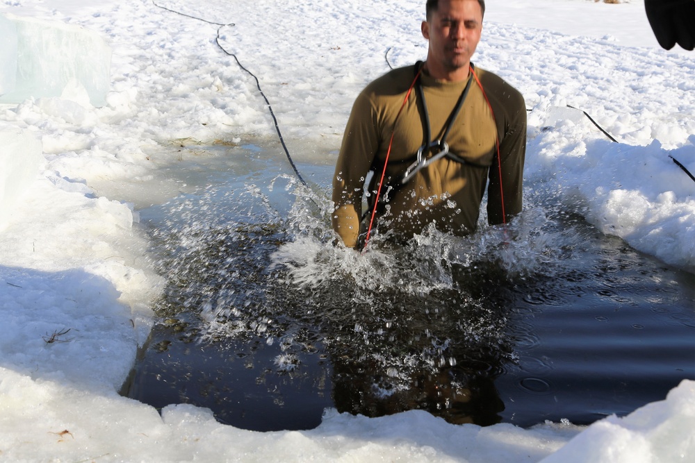 Cold-Weather Operations Course Class 18-04 students complete cold-water immersion training at Fort McCoy