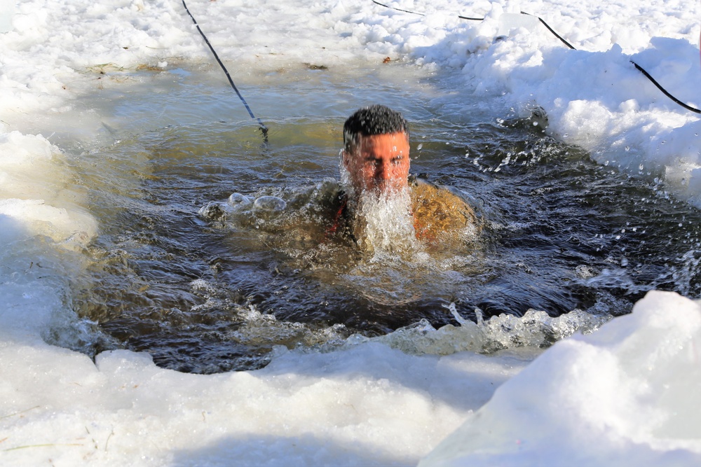 Cold-Weather Operations Course Class 18-04 students complete cold-water immersion training at Fort McCoy