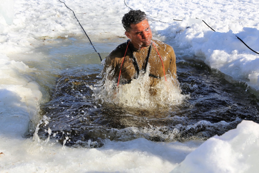 Cold-Weather Operations Course Class 18-04 students complete cold-water immersion training at Fort McCoy