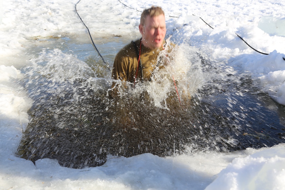 Cold-Weather Operations Course Class 18-04 students complete cold-water immersion training at Fort McCoy