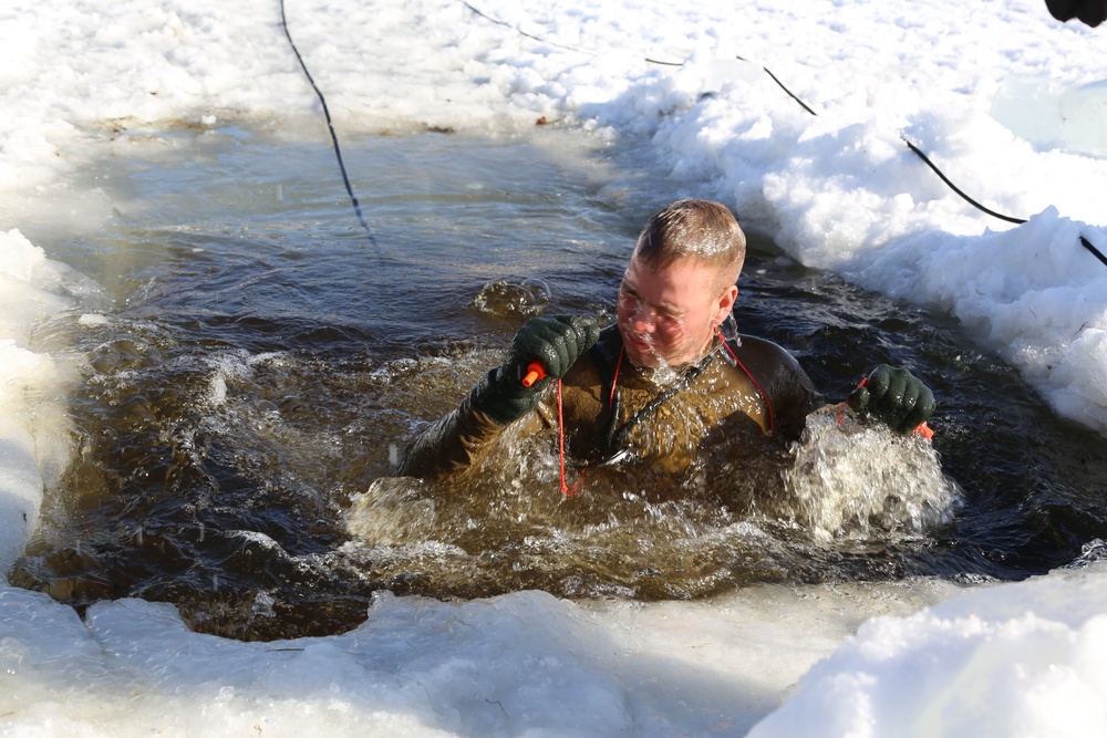 Cold-Weather Operations Course Class 18-04 students complete cold-water immersion training at Fort McCoy