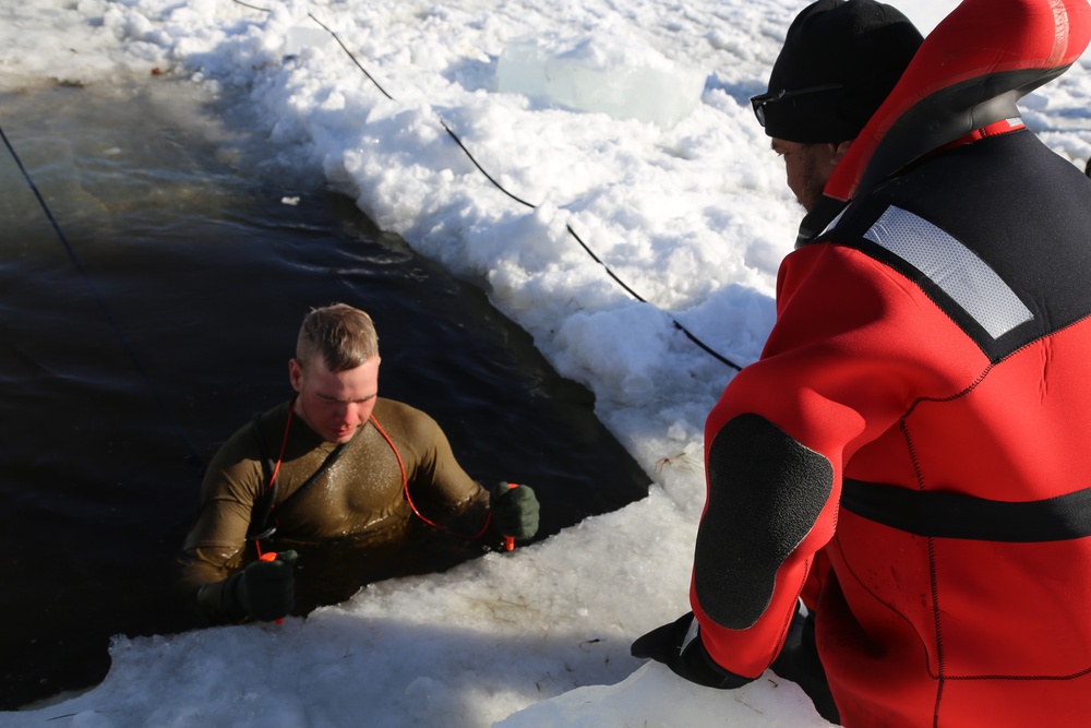 Cold-Weather Operations Course Class 18-04 students complete cold-water immersion training at Fort McCoy