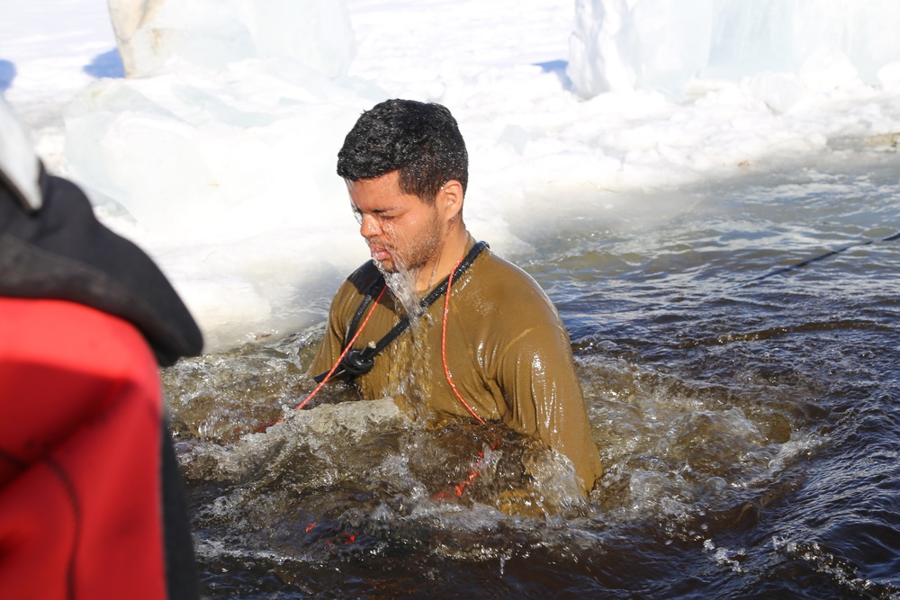 Cold-Weather Operations Course Class 18-04 students complete cold-water immersion training at Fort McCoy