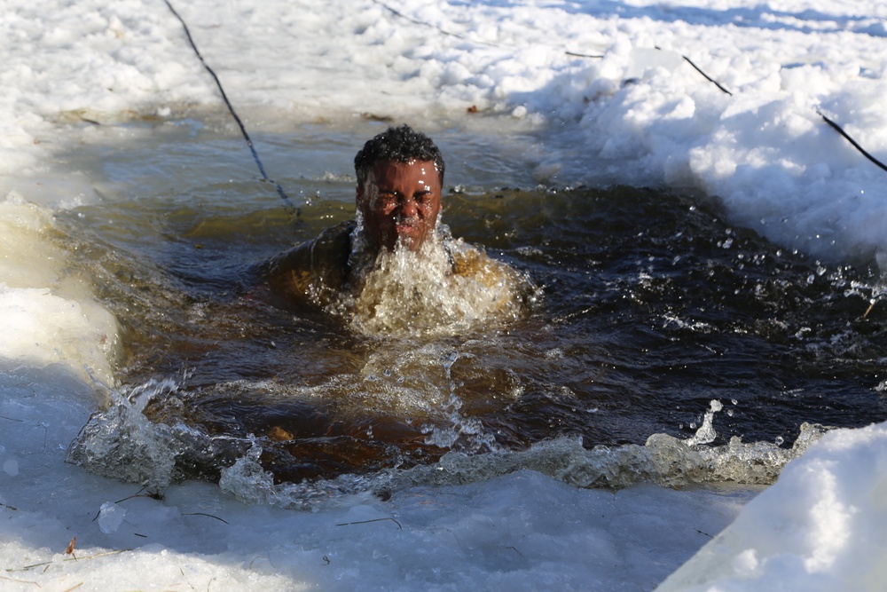 Cold-Weather Operations Course Class 18-04 students complete cold-water immersion training at Fort McCoy