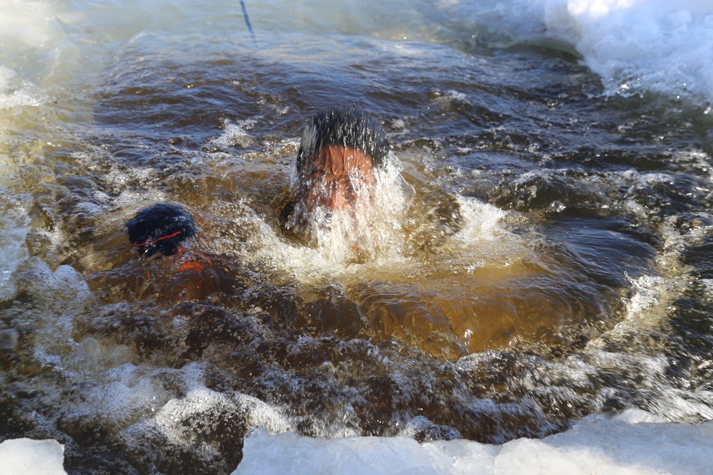 Cold-Weather Operations Course Class 18-04 students complete cold-water immersion training at Fort McCoy