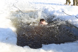 Cold-Weather Operations Course Class 18-04 students complete cold-water immersion training at Fort McCoy