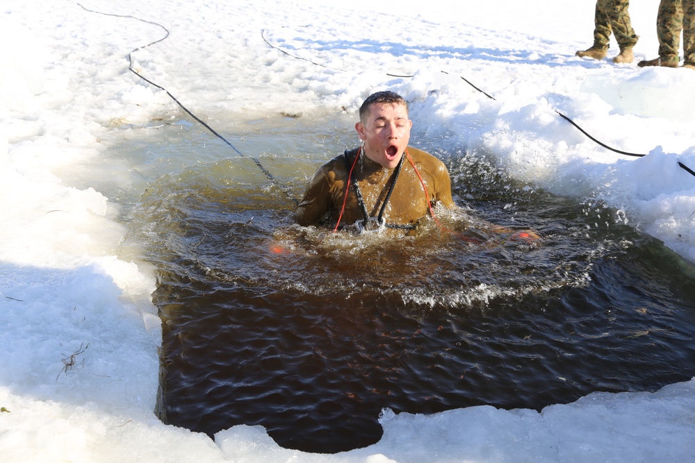 Cold-Weather Operations Course Class 18-04 students complete cold-water immersion training at Fort McCoy