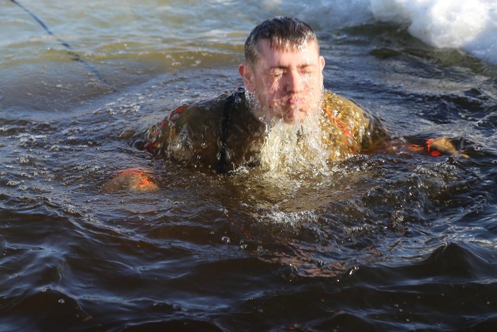 Cold-Weather Operations Course Class 18-04 students complete cold-water immersion training at Fort McCoy