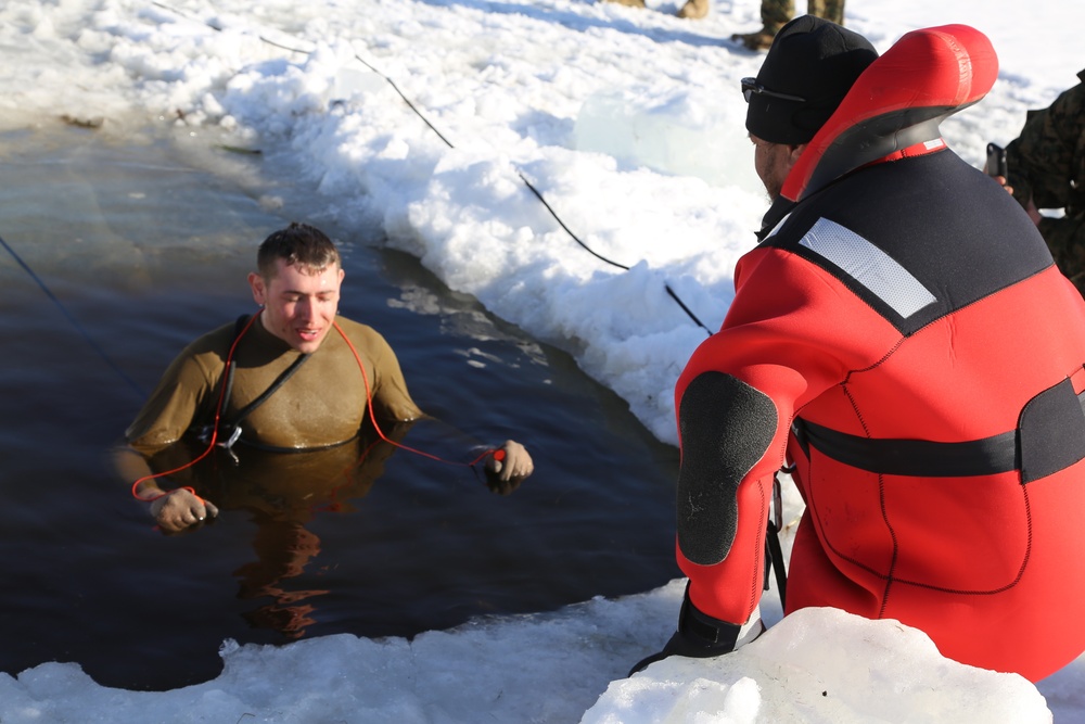 Cold-Weather Operations Course Class 18-04 students complete cold-water immersion training at Fort McCoy