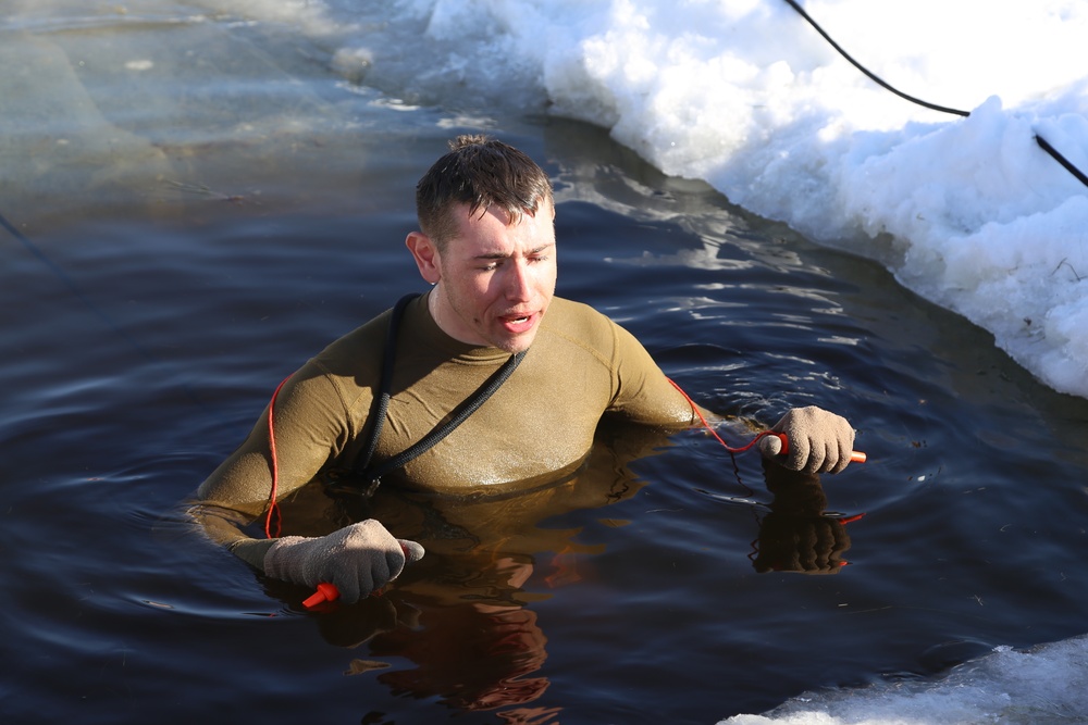 Cold-Weather Operations Course Class 18-04 students complete cold-water immersion training at Fort McCoy