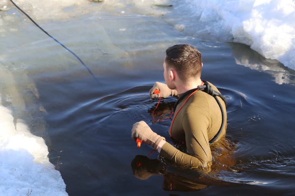 Cold-Weather Operations Course Class 18-04 students complete cold-water immersion training at Fort McCoy