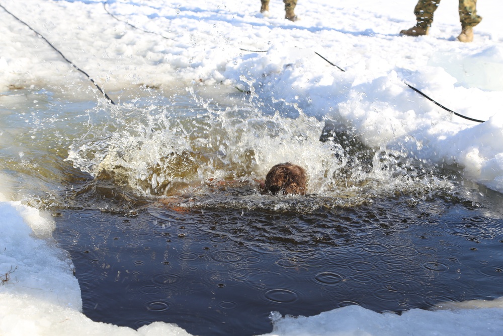 Cold-Weather Operations Course Class 18-04 students complete cold-water immersion training at Fort McCoy